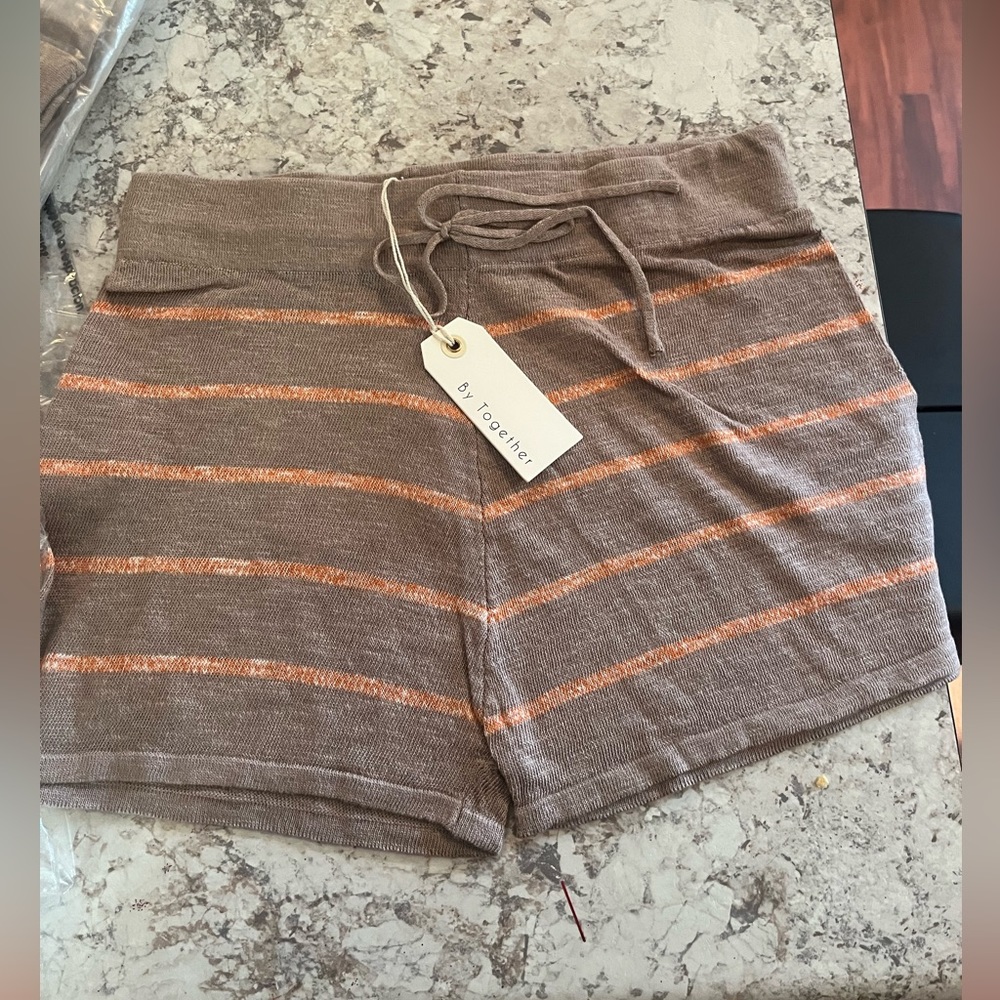 Brown and coral shorts.